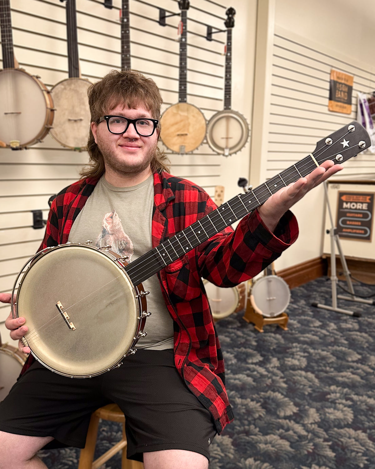 Showroom photo of Enoch Dobson Model Open Back Banjo (2008)