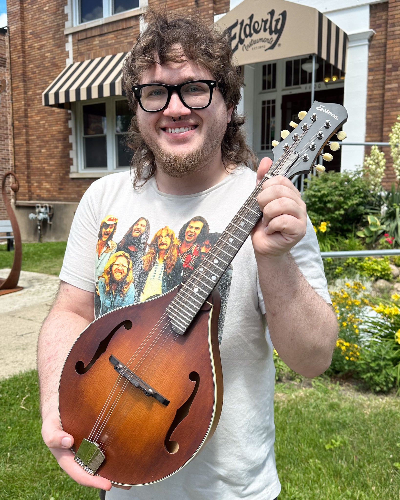 Showroom photo of Eastman MD305 Adirondack Wide Neck Amberburst Mandolin & Case