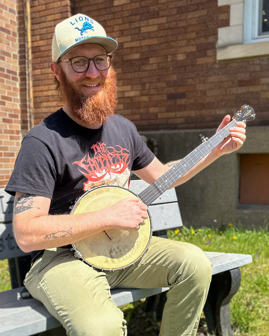 Showroom photo of Chanterelle Mike Ramsey Bacon Model Timeless Timber Test Openback Banjo (2004)