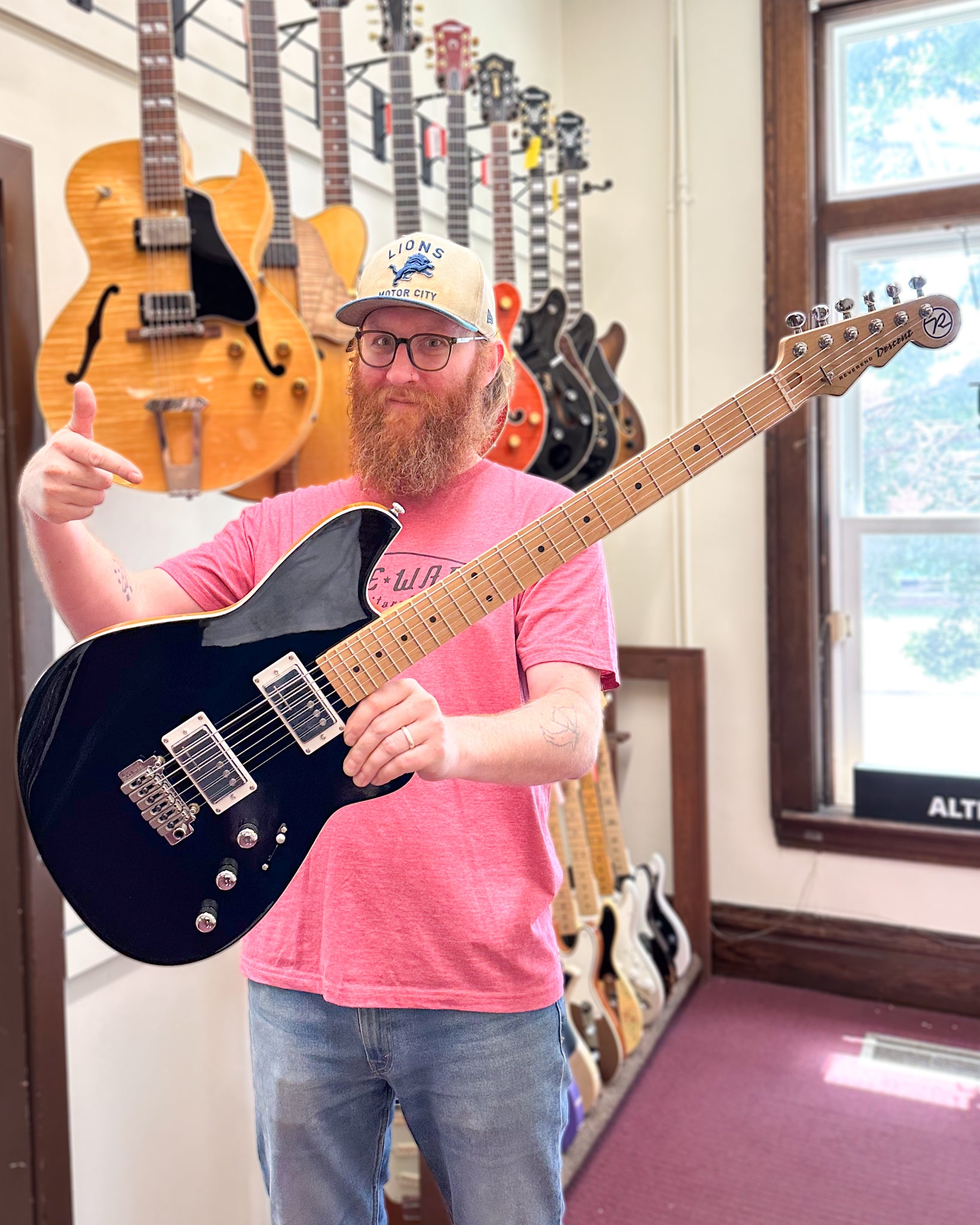 Showroom photo of Reverend Descent Wilkinson Electric Baritone Guitar, Midnight Black