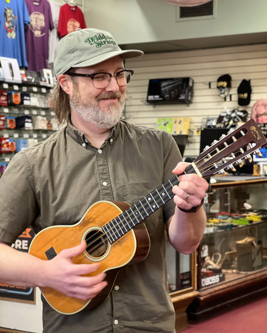 Showroom photo of Martin T-28 Tiple (1972)