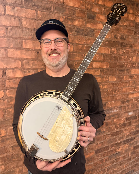 Showroom photo of Gibson TB-3 Tenor Banjo (1928)