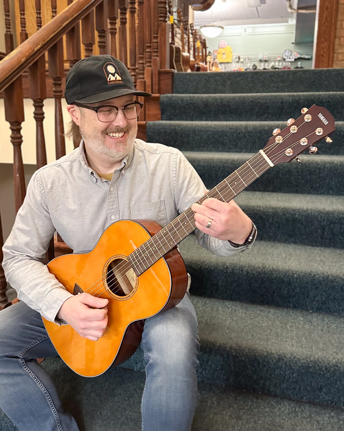 Showroom photo of Yamaha CSF1M Vintage Natural Parlor Guitar & Gigbag