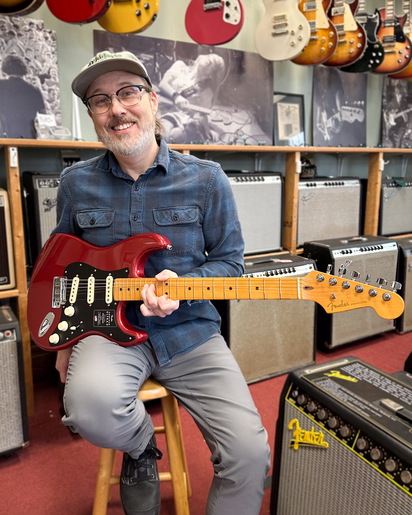 Showroom photo of Fender American Ultra II Stratocaster Electric Guitar & Case, Sinister Red