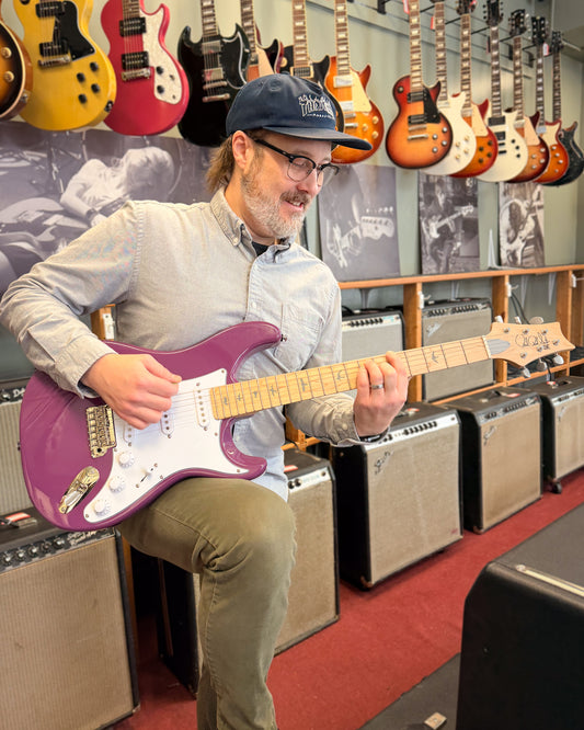 Showroom photo of PRS SE Silver Sky Maple Electric Guitar, Summit Purple