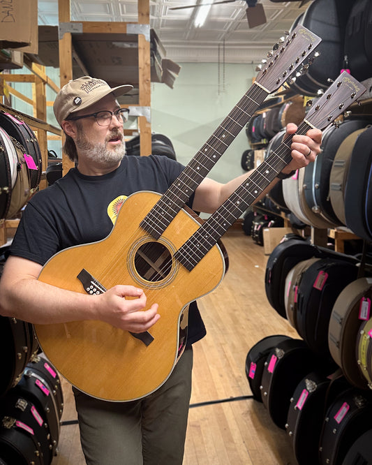 Showroom photo of Martin Grand J28E Double Neck Acoustic Electric Guitar & Case