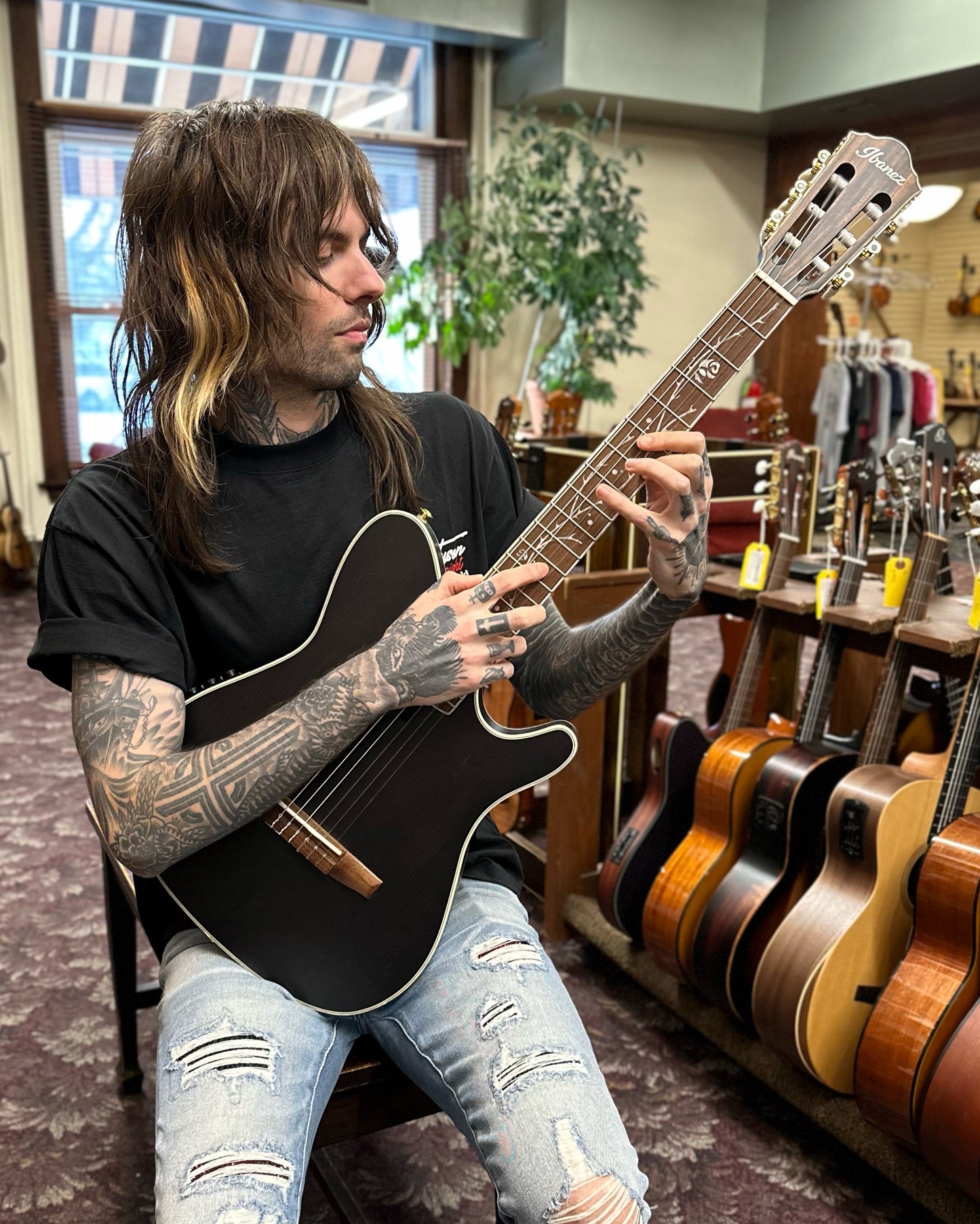 Showroom photo of Front of Ibanez TOD10N Tim Henson Signature Acoustic-Electric Nylon String Guitar