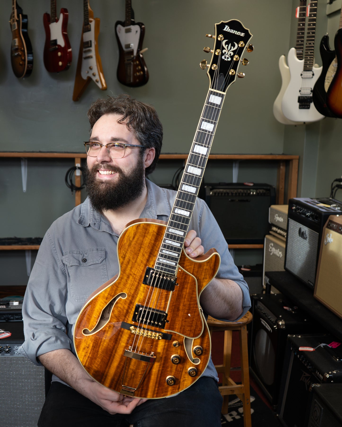 Showroom photo of Ibanez Artcore Expressionist AG95K Hollowbody Guitar, Natural