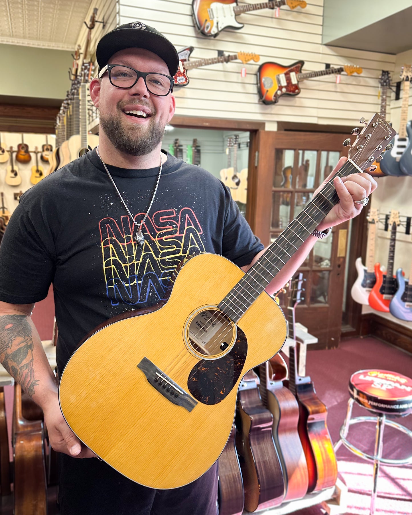 Showroom photo of Martin 000E Retro Plus Mahogany Acoustic Guitar & Gigbag