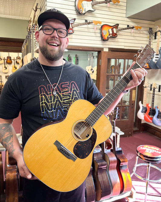 Showroom photo of Martin 000E Retro Plus Mahogany Acoustic Guitar & Gigbag