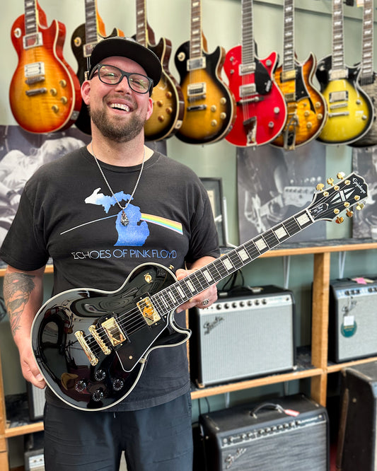 Showroom photo of Epiphone Les Paul Custom Electric Guitar & Gigbag, Ebony
