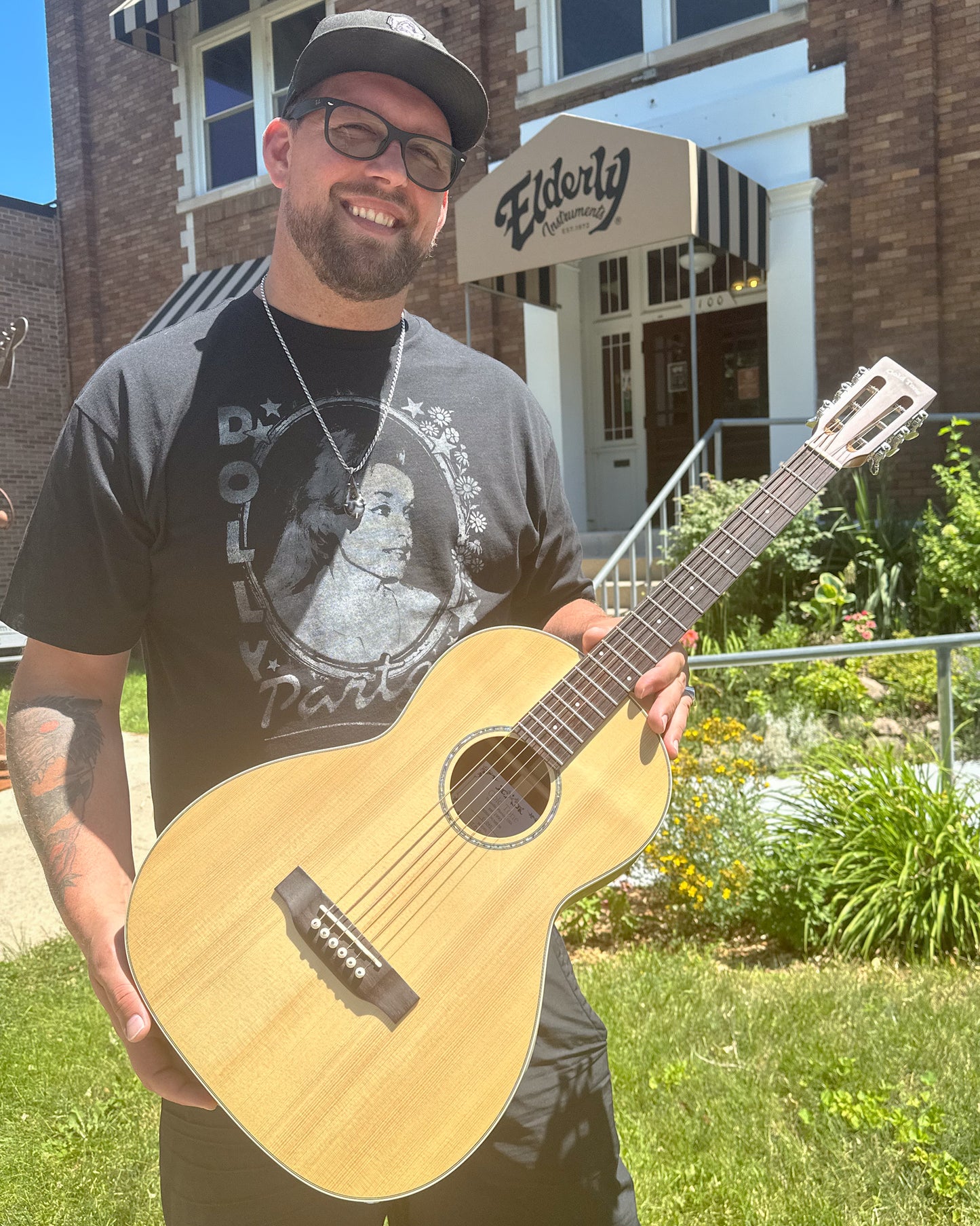 Showroom photo of Gold Tone Parlor Acoustic-Electric Guitar, Natural Top