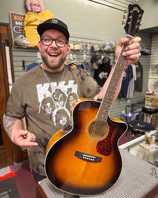 Showroom photo of Guild F-250CE Archback Deluxe Jumbo Cutaway Acoustic Guitar