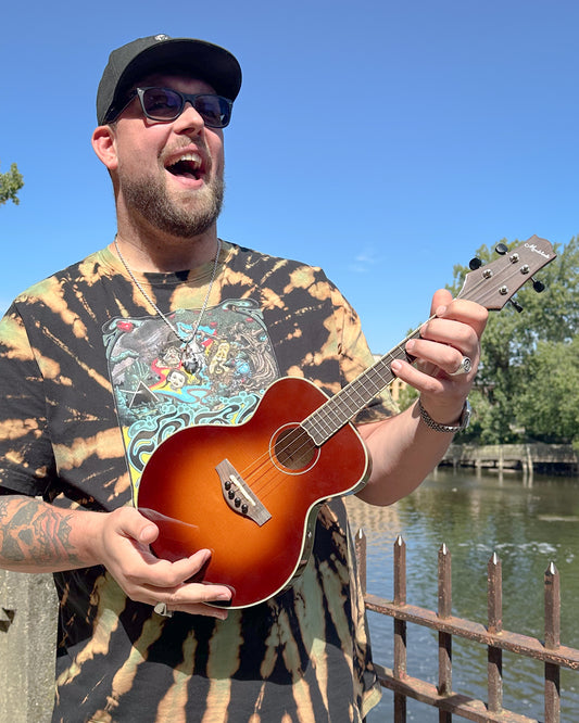 Showroom photo of KR Strings Mandolindo Custom Deluxe Curly Maple