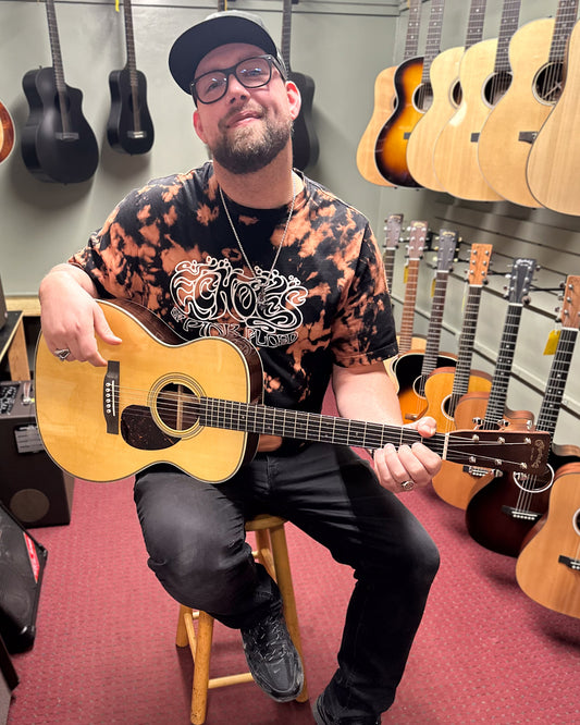 Showroom photo of Martin OM-28E Guitar & Case, with LR Baggs Anthem Pickup