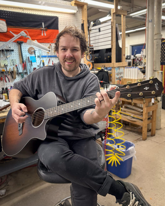 Showroom photo of Taylor Builder's Edition 324ce Acoustic Guitar & Case
