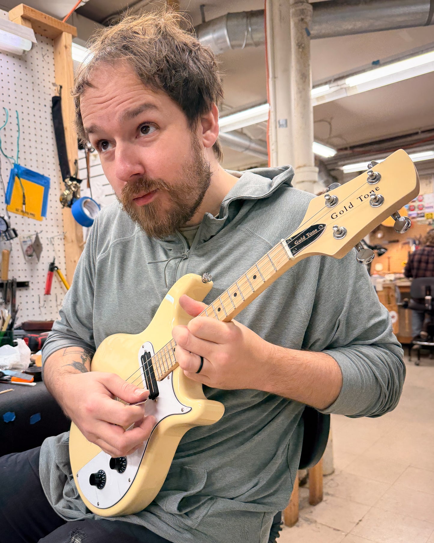 SHowroom photo of Gold Tone Solid Body Electric Mandolin & Gigbag, 4-String