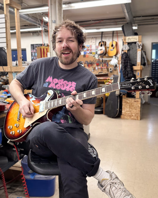Showroom photo of Gibson Les Paul Standard 60s Figured Electric Guitar & Case, Bourbon Burst