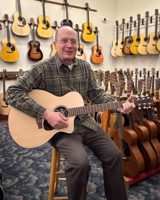 Showroom photo of Martin SC-10E Modern Acoustic Guitar & Gigbag