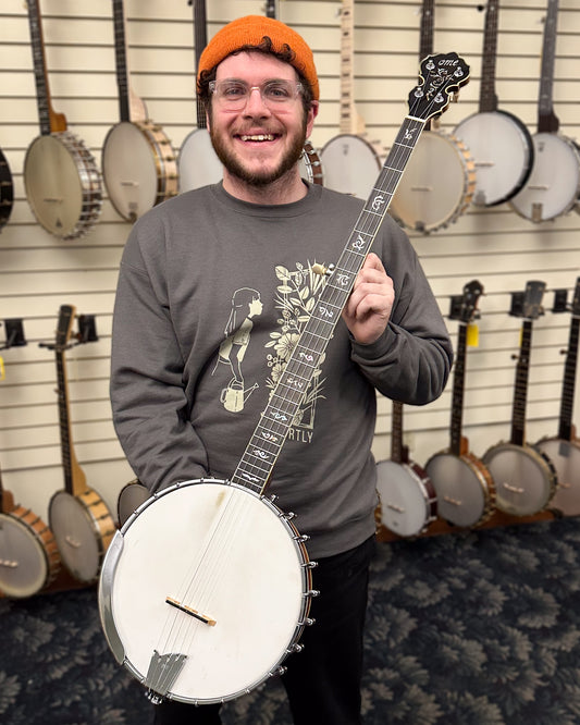 Showroom photo of Ome Custom Silver Columbine Extra Long Neck (2007)