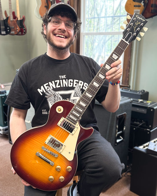 Showroom photo of Epiphone IGC 1959 Les Paul Standard Reissue Electric Guitar & Case, Deep Cherry Sunburst