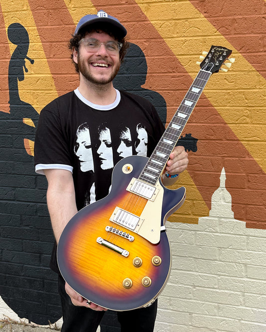 Showroom photo of Epiphone IGC 1959 Les Paul Standard Reissue Electric Guitar & Case, Dark Burst