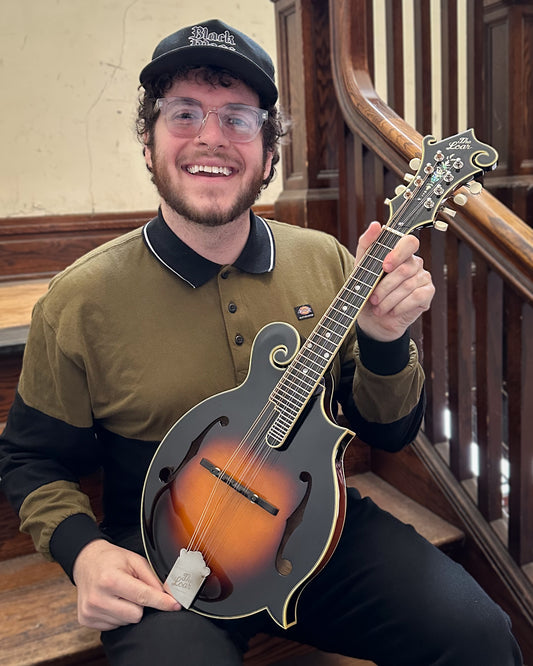 Showroom photo of The Loar LM-600-VS Mandolin and Case