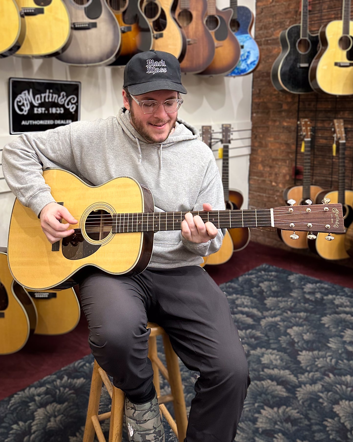 Showroom photo of Martin OM-28E Guitar & Case, with LR Baggs Anthem Pickup, 2024 Edition