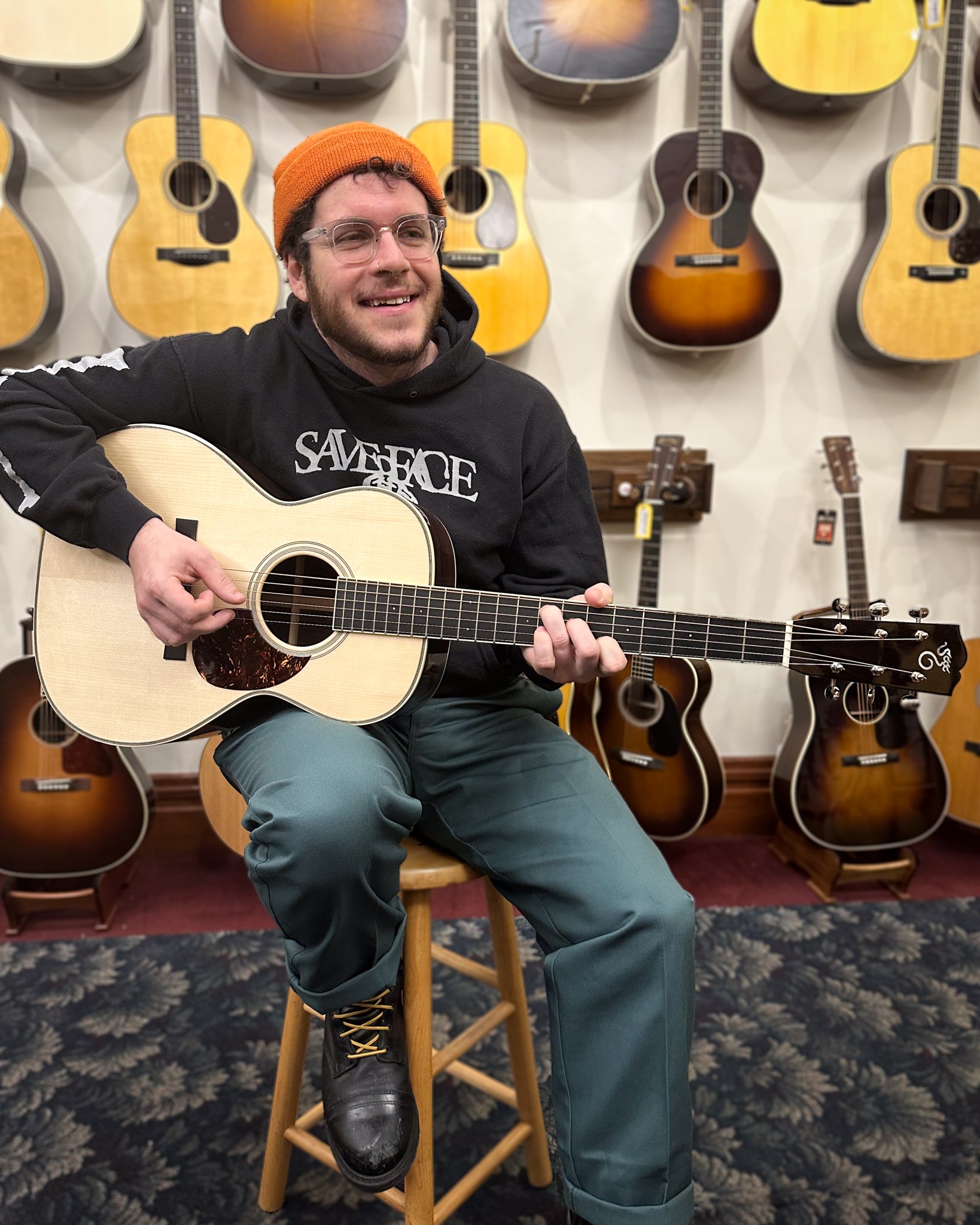 Showroom photo of Santa Cruz Custom H Model Acoustic Guitar