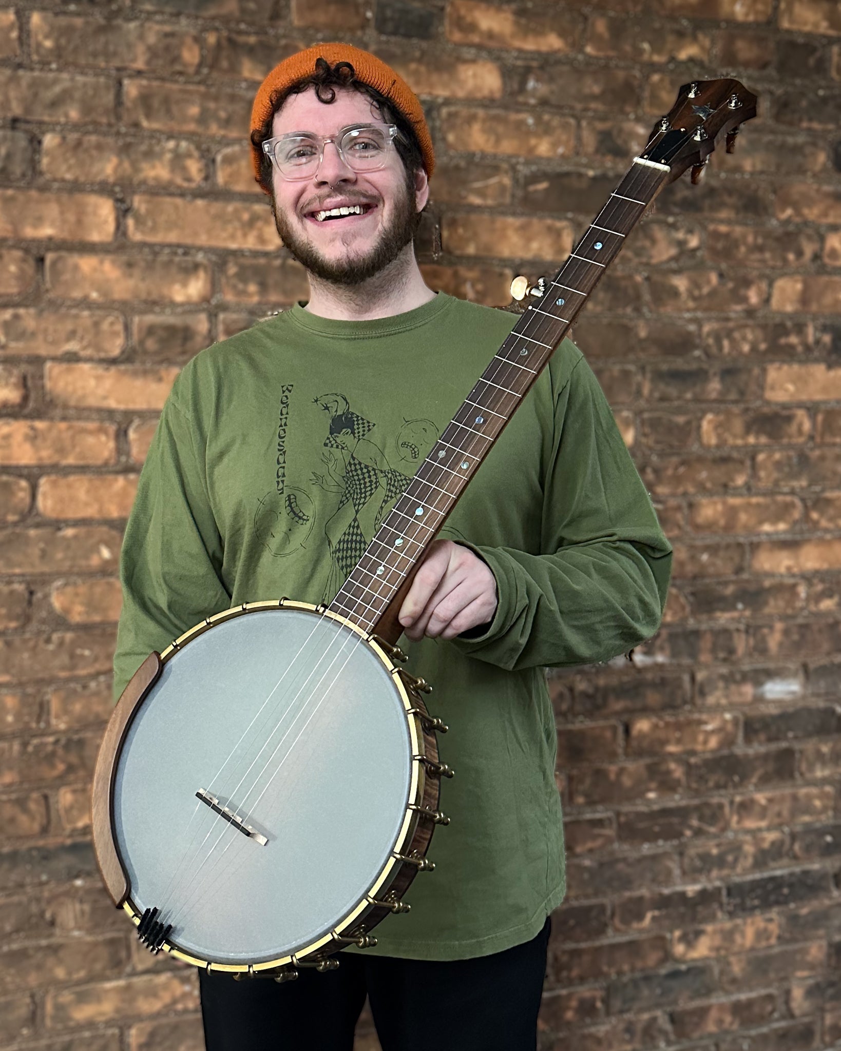 Showroom photo of Starr Banjos 11" Openback Banjo & Gigbag, Curly Maple