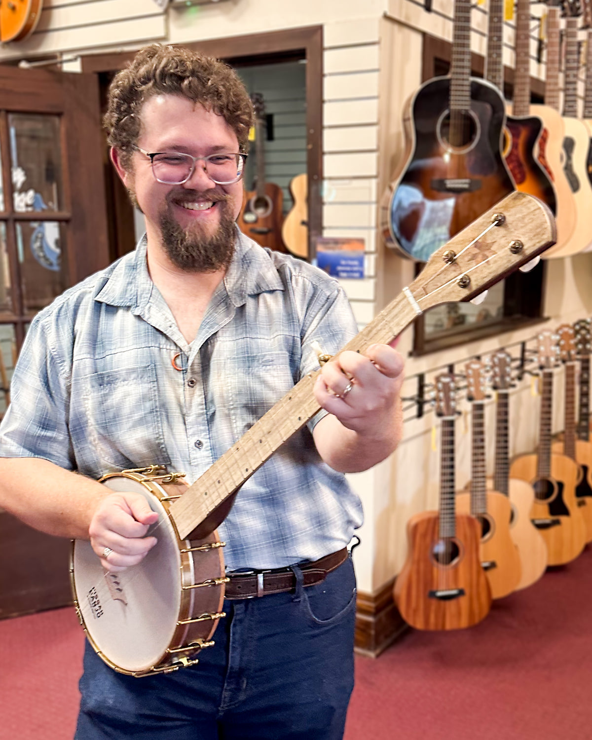 Showroom photo of Pisgah Possum 11in Short Scale Openback Banjo & Gigbag, Walnut