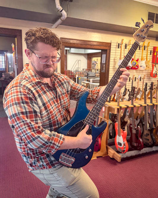 Showroom photo of Sterling by Music Man Sterling Electric Bass, Blue Pearl