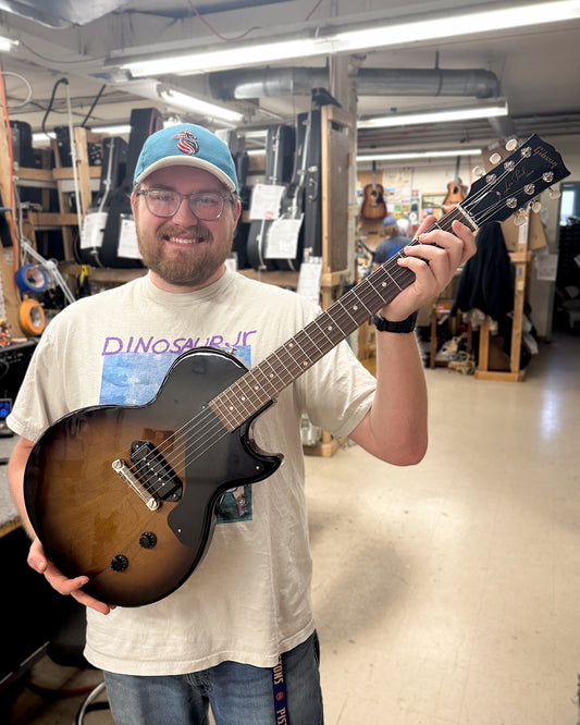 Showroom photo of Gibson Les Paul Junior Electric Guitar & Case, Vintage Tobacco Burst