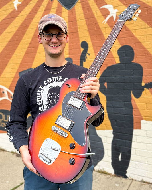 Showroom photo of Collings Custom 360 LT M Electric Guitar & Case, Sunburst