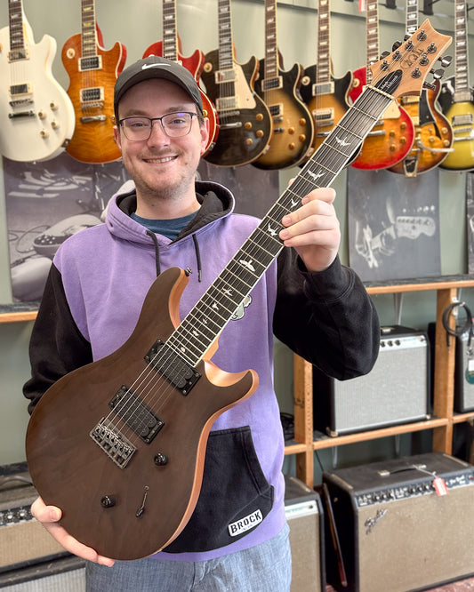 Showroom photo of PRS SE Mark Holcomb 7-String Electric Guitar (2020)
