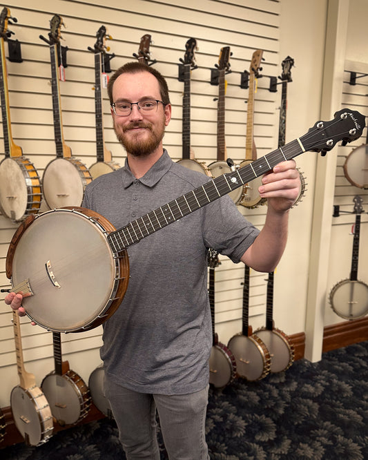 Showroom photo of Nechville Atlas 12" Walnut Open Back Banjo (c.2016)