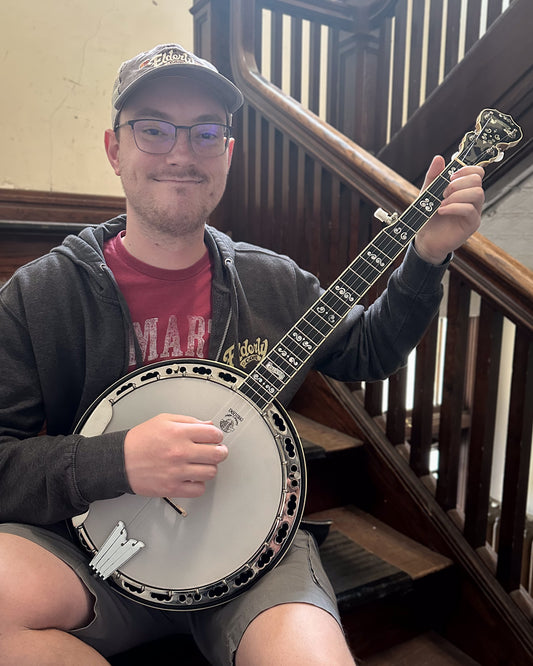 Showroom photo of Deering Calico Resonator Banjo (1999)