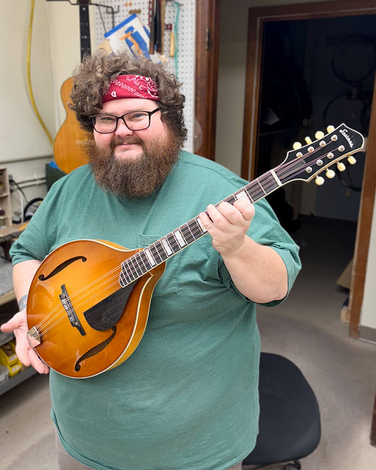 Showroom photo of Eastman MDO605 Goldburst Octave Mandolin & Case