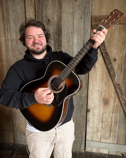 Showroom photo of Martin 000-28 Sunburst Guitar & Case, 2024 Edition
