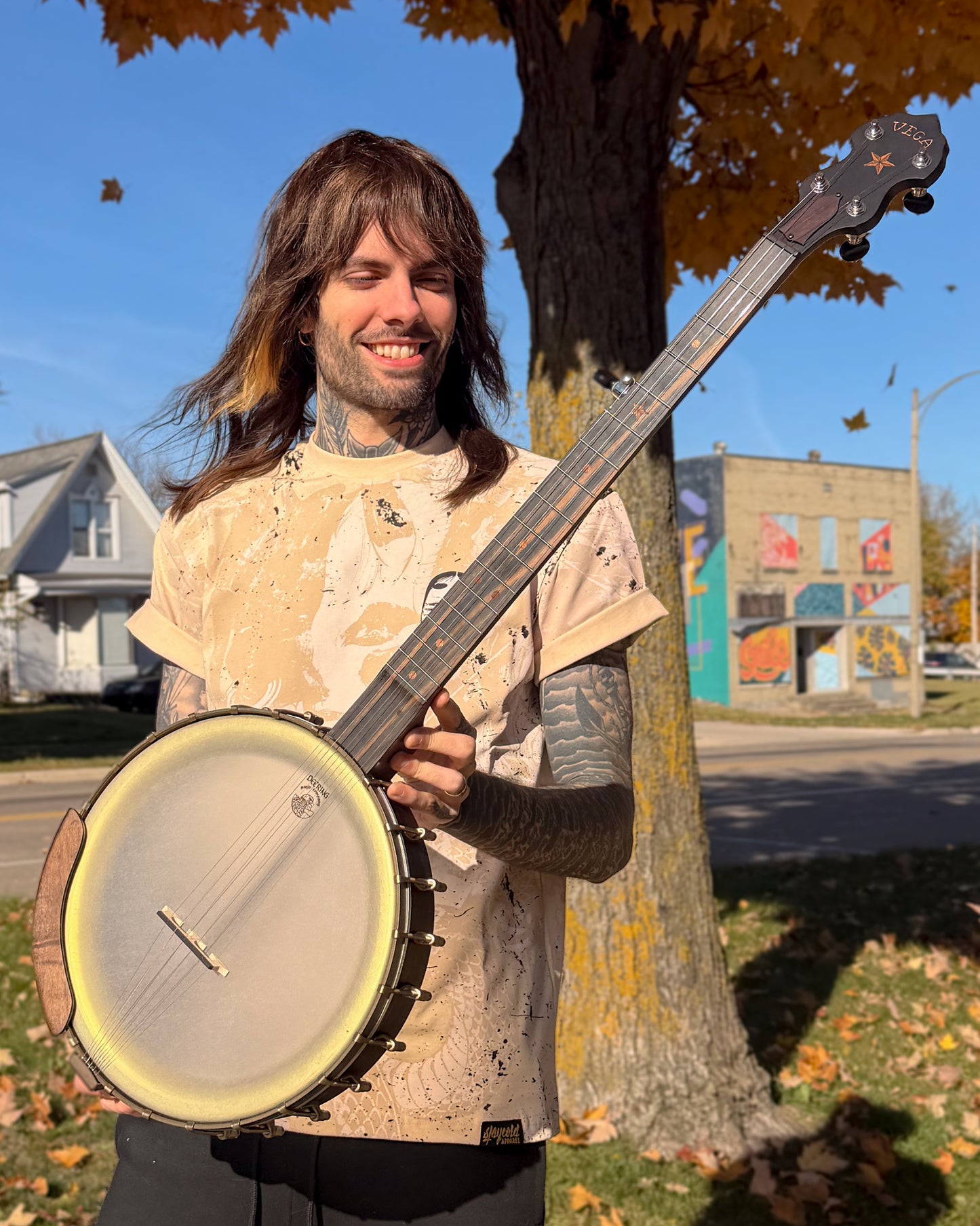 Showroom photo of Deering Vega Vintage Star 12" Openback Banjo & Case, Maple