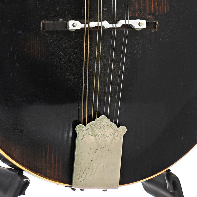 tailpiece and bridge of Gibson A-2 
