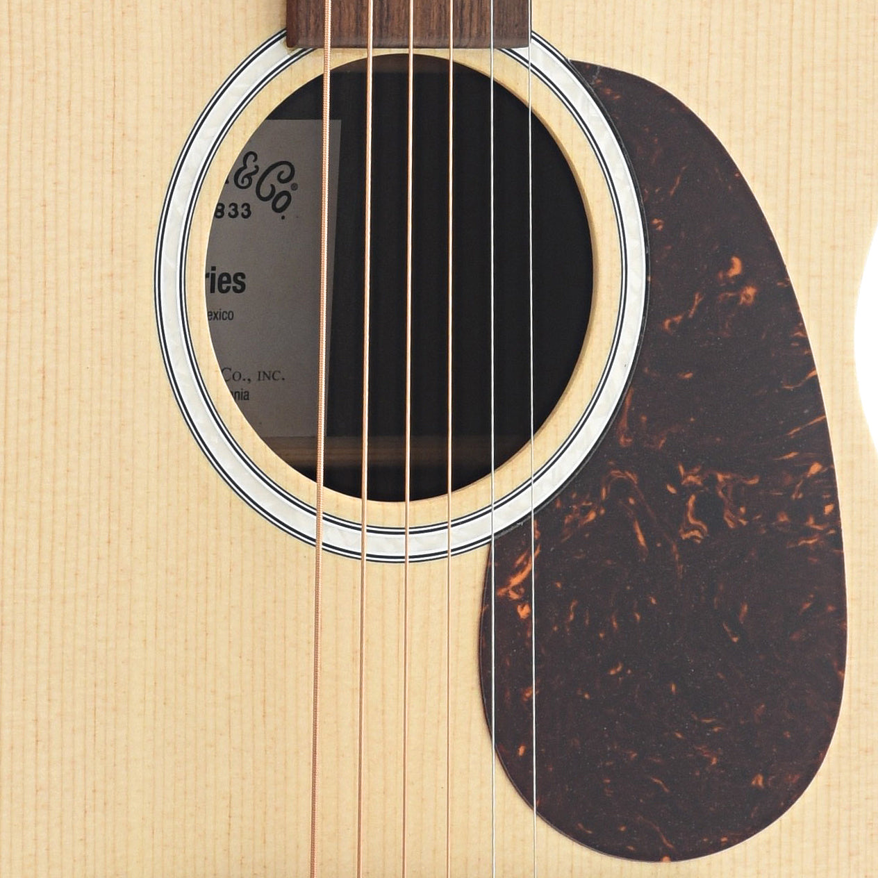 Soundhole and Pickguard of Martin 00-X2E Guitar
