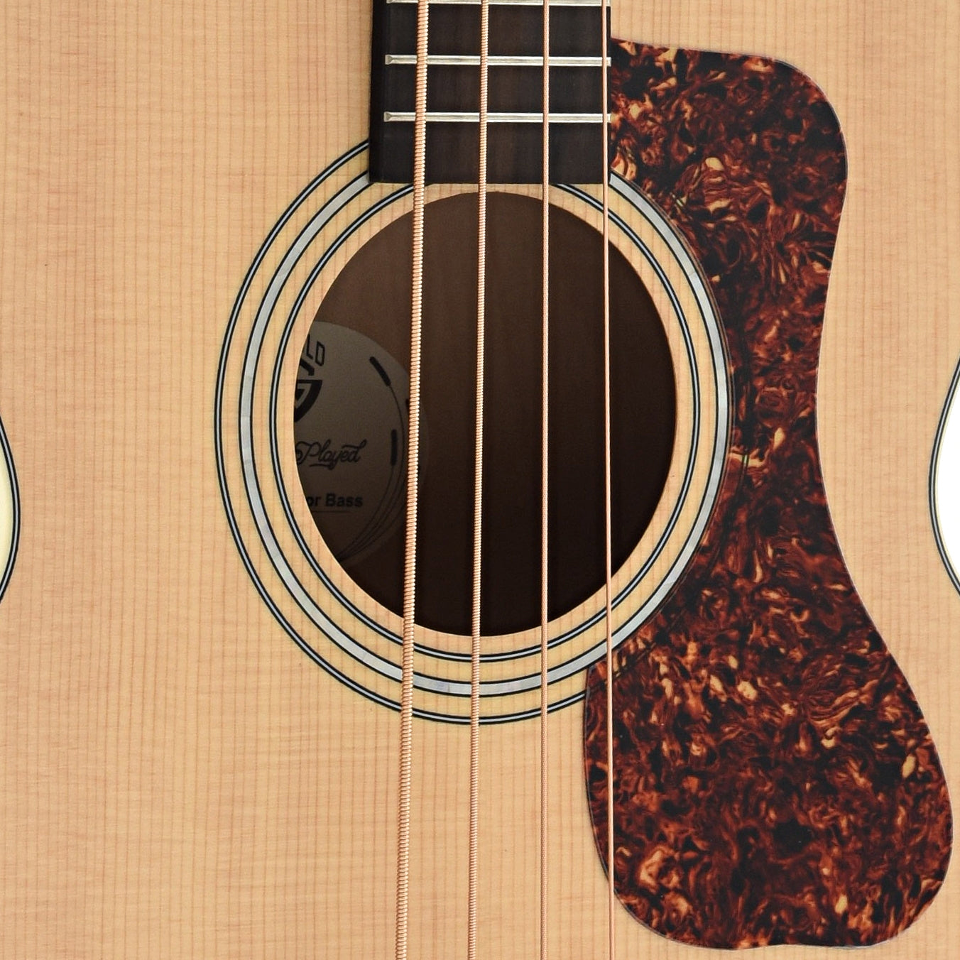 Soundhole and Pickguard of Guild Jumbo Junior Acoustic Bass Guitar
