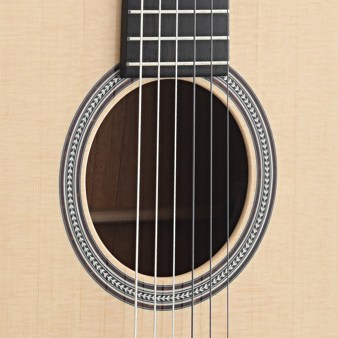 Soundhole of Martin 000C12-16E Nylon Guitar