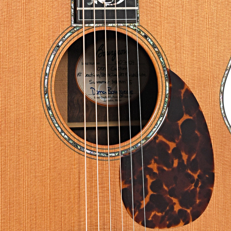 Sound hole and pickguard of Bourgeois Custom Style 42 OM Acoustic Guitar