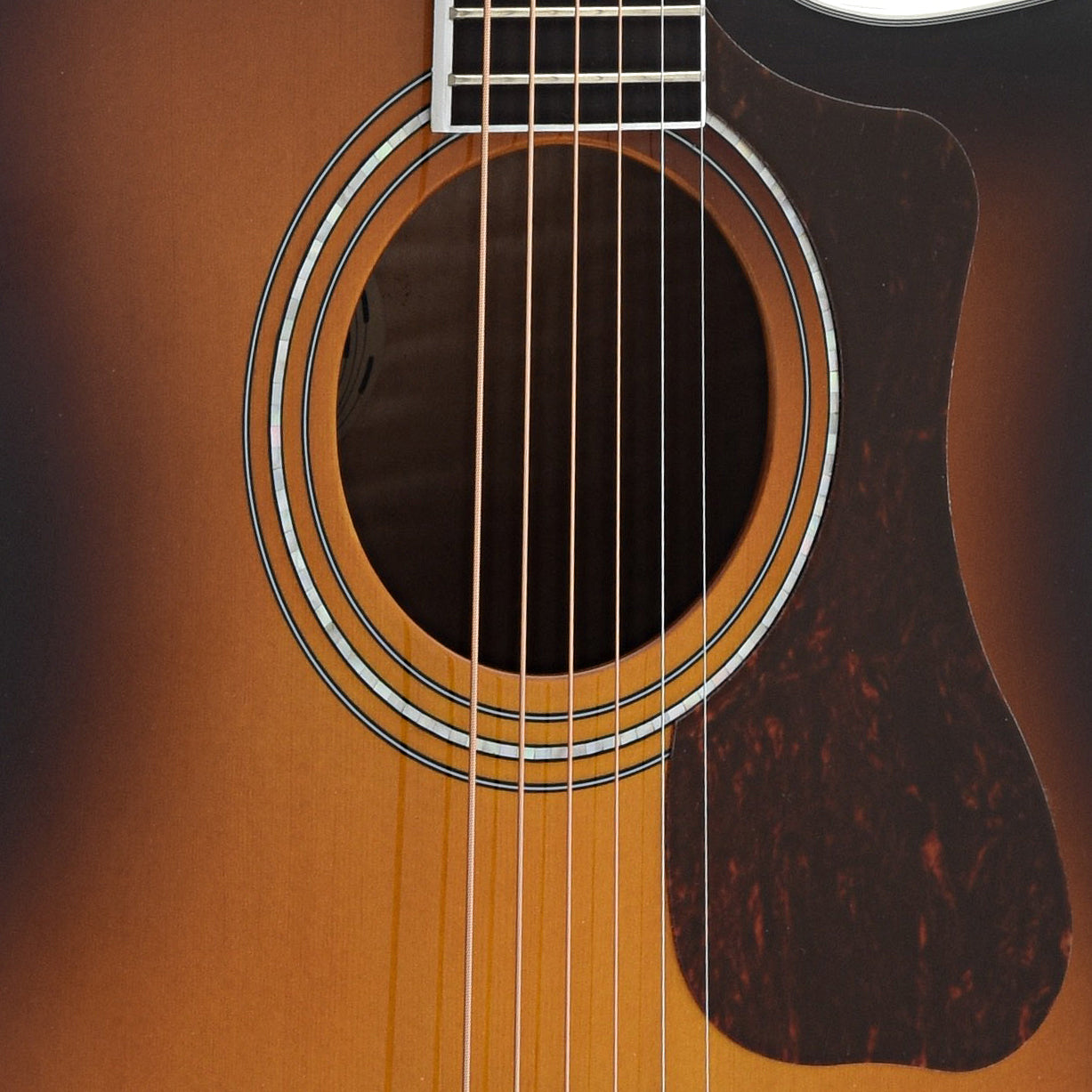 Soundhole and Pickguard of Guild F-250CE Archback Deluxe Jumbo Cutaway Acoustic Guitar
