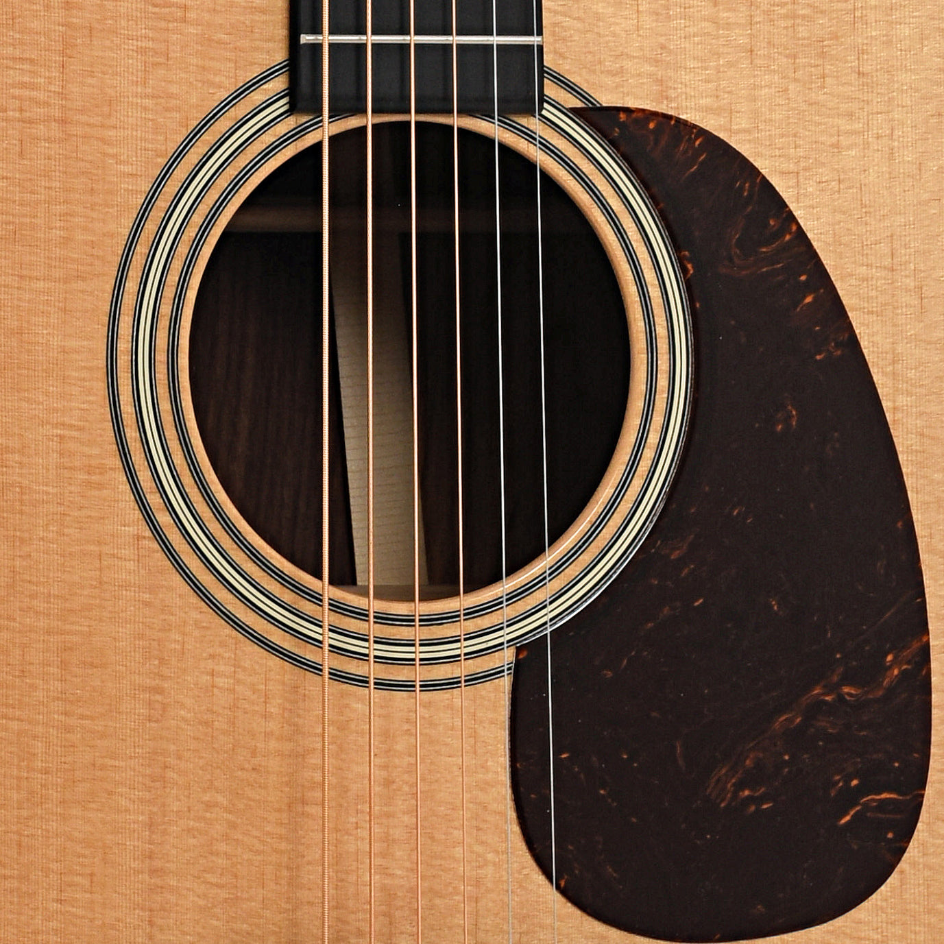 Sound hole and pickguard of Martin Super D Guatemalan Rosewood Dreadnought 