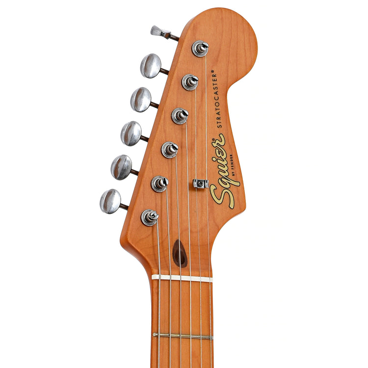 Front headstock of Squier 40th Anniversary Stratocaster, Vintage Edition, Satin Sonic Blue