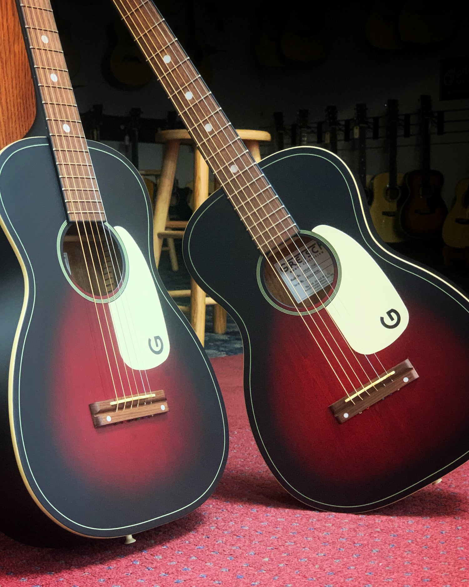 Front and Sides of two Gretsch G9500 Jim Dandy Flat Top Acoustic Guitar